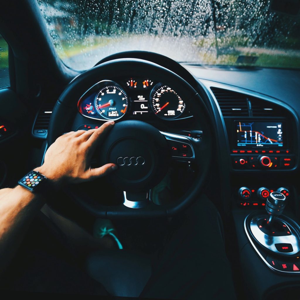black Audi vehicle steering wheel